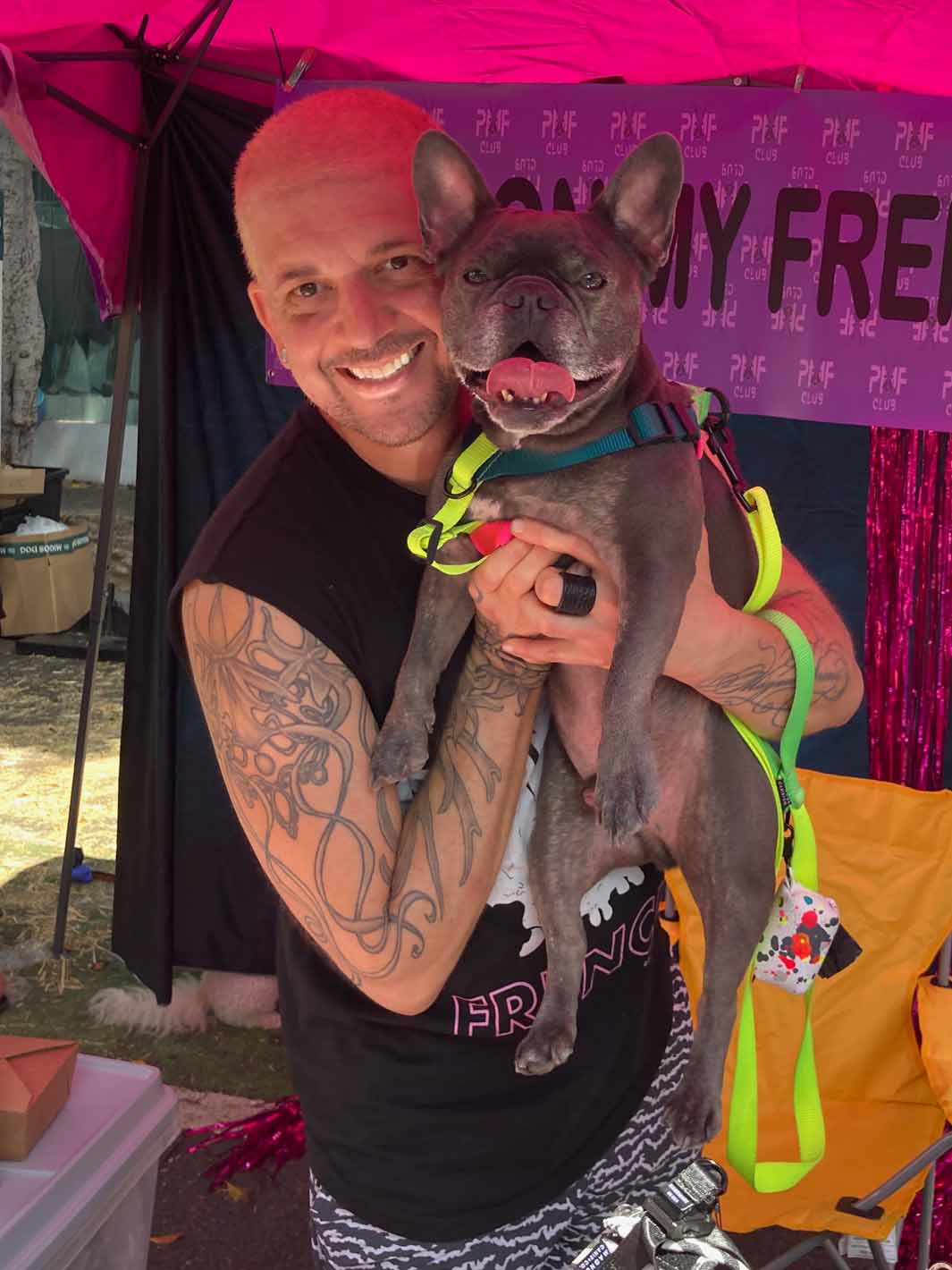 An image of the owner of MAGNUS Canis with his smiling Frenchie sidekick.