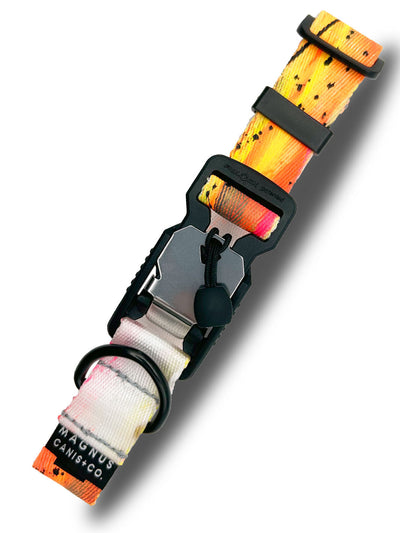 A bright orange and yellow hand painted dog collar with magnetic buckle by MAGNUS Canis.