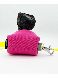 A hot pink denim poop bags case by MAGNUS Canis.