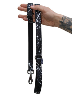 A black vegan leather dog leash with white hand painted pattern by MAGNUS Canis.