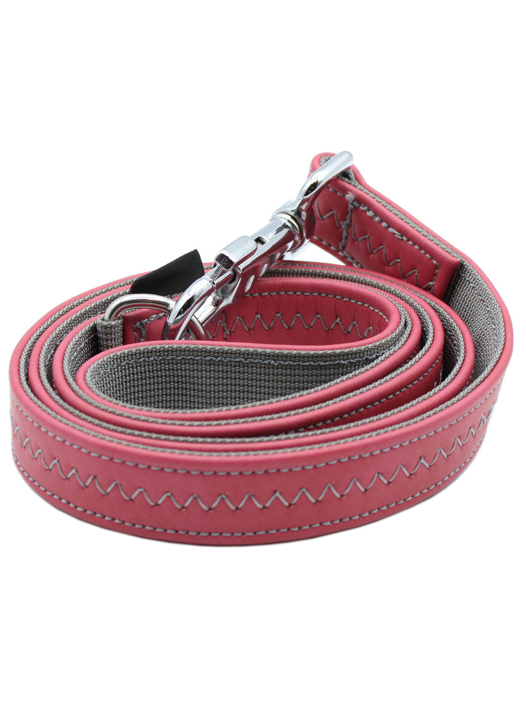 A MAGNUS Canis pink vegan leather leash with hand stitching.
