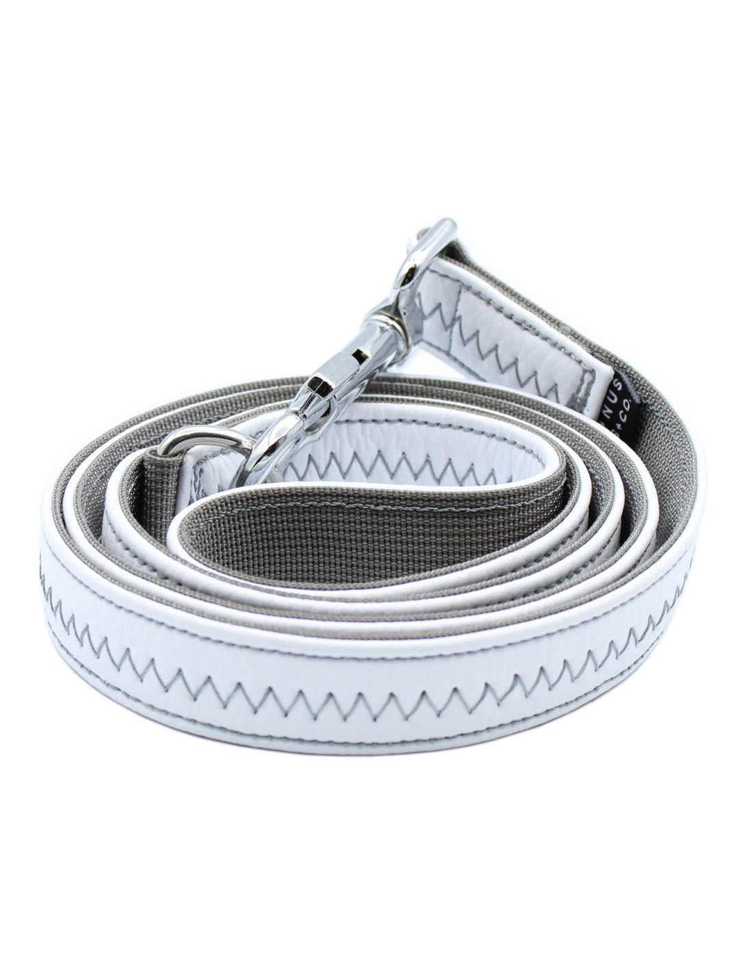 A white vegan leather hand crafted dog leash by MAGNUS Canis.