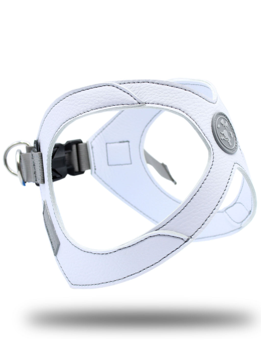 MAGNUS Canis vegan leather frenchie harness in white as seen from a three quarter view.