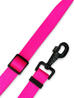 Neon pink nylon strap webbing dog leash with matte black trims by MAGNUS Canis.