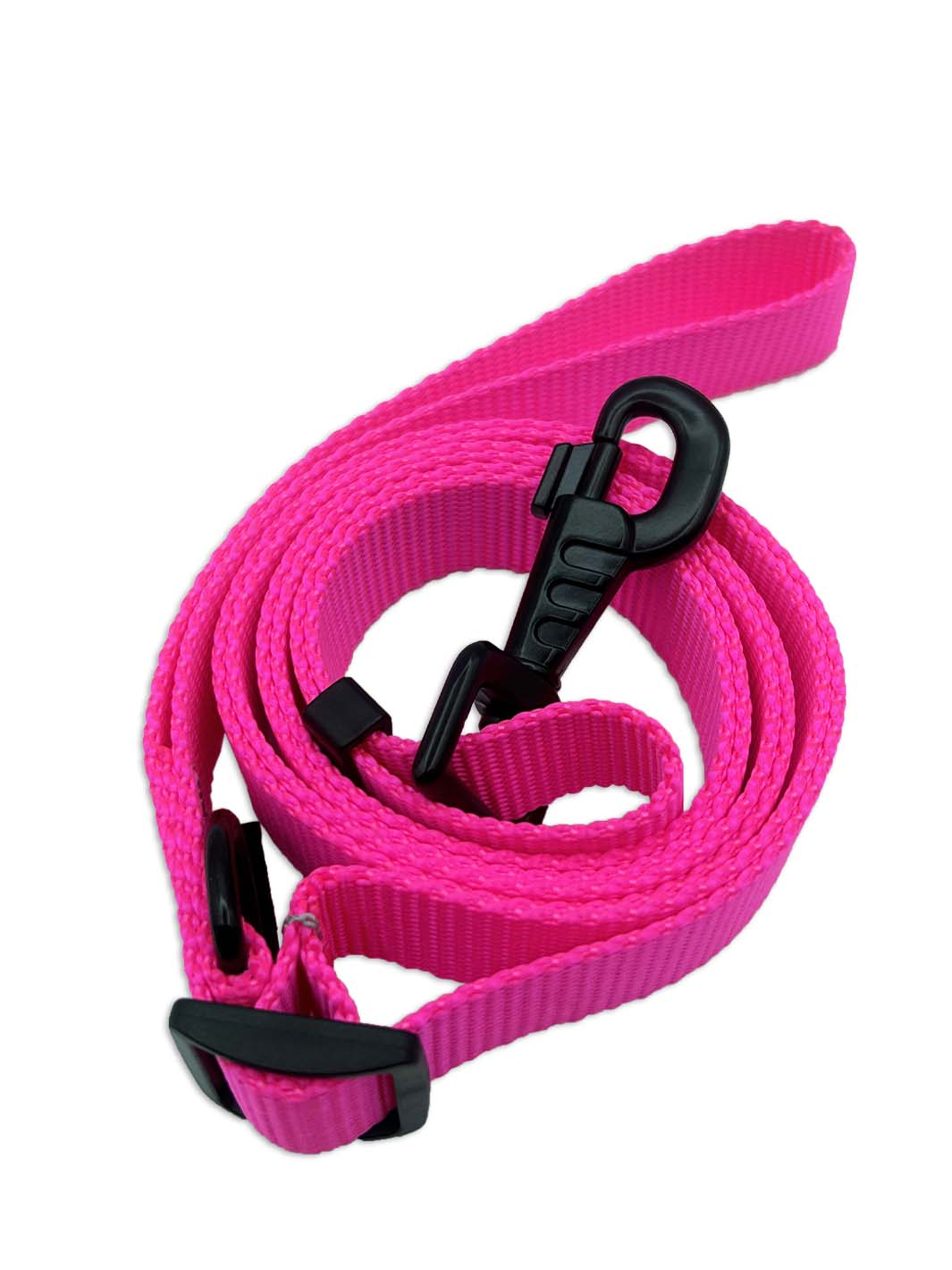 Neon pink dog leash in nylon strap coiled on surface.
